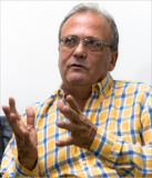 Braulio Merino: A Dios rogando y con el mazo dando trabajare...